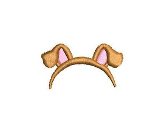 May include: A brown headband with two pink ears attached. The headband is designed to look like a dog's ears.