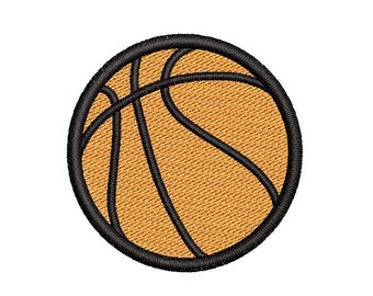 May include: A black and orange basketball with a stitched design.