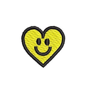 May include: A yellow heart-shaped smiley face patch with a black outline.