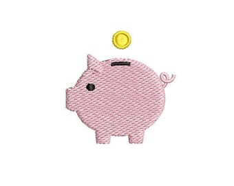 May include: A pink piggy bank with a black slot and a yellow coin on top.