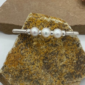 Bracciale avvolto in perle e argento