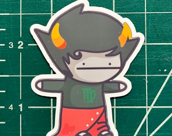 May include: A green and red cartoon character with black hair and yellow horns. The character is wearing a green shirt with a Virgo symbol and red pants. The character is standing with its arms outstretched.