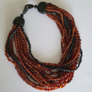 Avant-garde necklace by MONIES GERDA LYNGGAARD made of horn and ebony