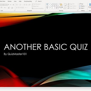 May include: A black background with colorful abstract shapes in red, orange, yellow, green, and blue. The text "ANOTHER BASIC QUIZ" is in white with the text "By QuizMaster101" below it.