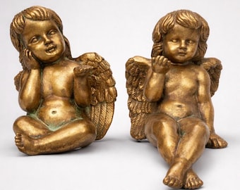 Figuritas de ángeles querubines de estilo vintage, ideales para colocar sobre una estantería.