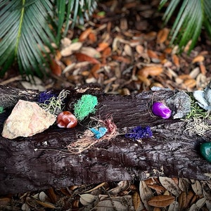 Ruby Zoisite or Obsidian Goddess Gaia Mother Nature of all life  Crystal Craving - Felicity Logs with raw stones and crystals
