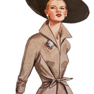 May include: A fashion illustration of a figure wearing a wide-brimmed black hat, a tan coat with a collared neckline and a tied waist, a silver brooch on the lapel, and white gloves. The figure has blonde hair, red lipstick, and white earrings.