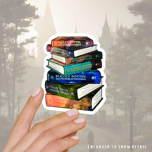 May include: A sticker featuring a stack of seven Harry Potter books with colorful spines and white pages. The titles include Harry Potter and the Sorcerer's Stone, Chamber of Secrets, Prisoner of Azkaban, Goblet of Fire, Order of the Phoenix, Half-Blood Prince, and Deathly Hallows.