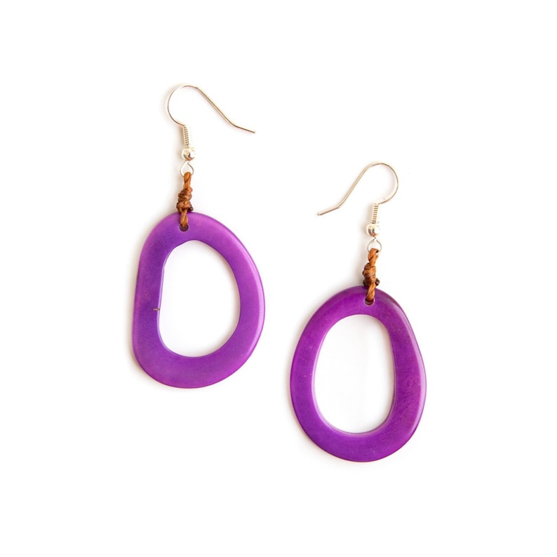 May include: A pair of purple oval-shaped earrings with a brown leather cord and silver hooks.