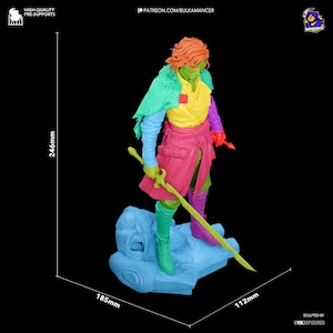 May include: A colorful figurine of a warrior with a sword, standing on a blue base. The figure is 246mm tall, 185mm wide, and 112mm deep. The warrior wears a mix of green, yellow, pink, purple, and orange clothing.