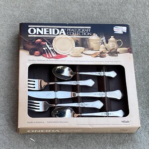Oneida Milady By Pfaltzgraff Stainless steel flatware 20 piece set Unused