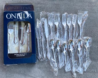 Oneida Cantata USA glossy stainless steel flatware 20 piece set, Service for 4. Unused