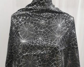 Tissu satiné noir avec des toiles d'araignées argentées pour Halloween, vendu en gros ou par mètre