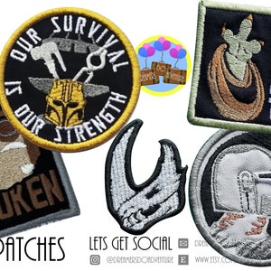 May include: A set of six embroidered iron-on patches featuring various characters and designs. The patches are black, white, gray, brown, and yellow. The patches include a Mandalorian helmet, a Grogu character, a character with a helmet and goggles, a character with a helmet and a weapon, a character with a weapon and a helmet, and a character with a weapon and a helmet.