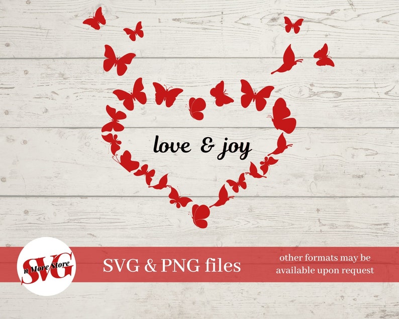 May include: Red butterfly silhouettes arranged in a heart shape with the text "love & joy" inside. The design is on a white wood background.
