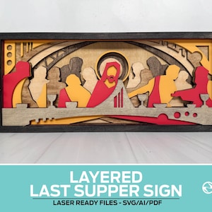 May include: A layered wooden sign depicting the Last Supper scene, featuring figures in red, yellow, and natural wood tones. The artwork is framed in black and includes the text "LAYERED LAST SUPPER SIGN".