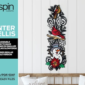 May include: A laser cut winter trellis design featuring a snowman, cardinals, and poinsettias. The design is available in SVG, AI, PDF, and DXF formats.