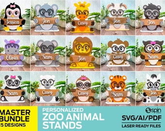 May include: A set of 15 digital cut files featuring various zoo animals wearing glasses and holding signs with names. The animals include a penguin, elephant, giraffe, goat, panda, hippopotamus, koala, lion, monkey, zebra, and tiger. The files are in SVG, AI, and PDF formats and are laser-ready.