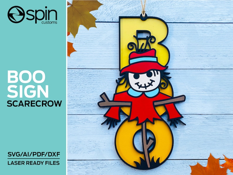 May include: A yellow letter "B" with a scarecrow face and red hat. The scarecrow is holding a stick with a brown base. The letter is on a light blue wooden background.  "BOO SIGN SCARECROW" and "SVG/AI/PDF/DXF LASER READY FILES" are written in black text on a teal background.