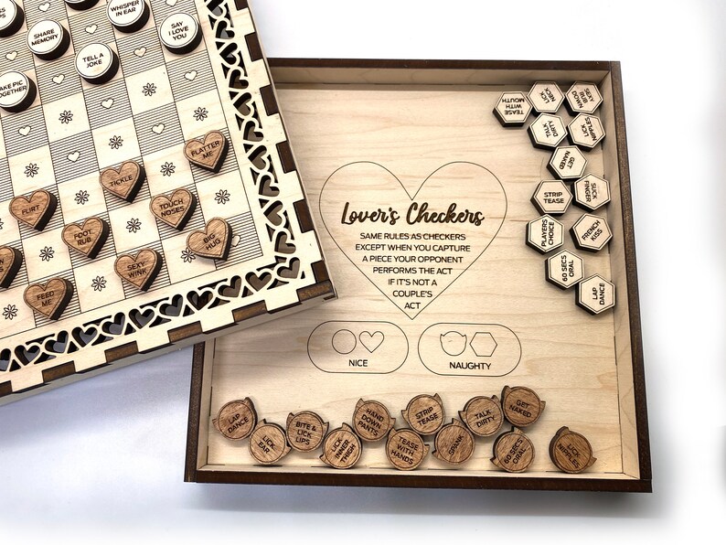 May include: A wooden game board with a checkerboard pattern and heart-shaped pieces. The game is called "Lover's Checkers" and the pieces have phrases like "Foot Rub" and "Say I Love You".
