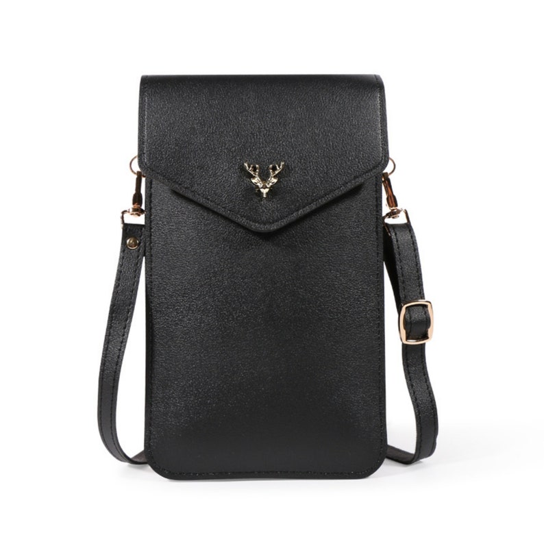 May include: Black leather phone case with a gold deer head design and a long adjustable strap.