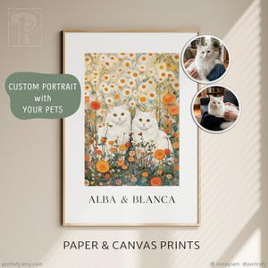 May include: A framed print featuring two white cats amidst a field of orange and yellow flowers. The text "ALBA & BLANCA" is below the image. The words "CUSTOM PORTRAIT with YOUR PETS" are on a green oval. The bottom text reads "PAPER & CANVAS PRINTS".