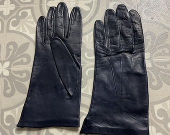 Pair of ladies navy blue supple soft real leather gloves fits size Small