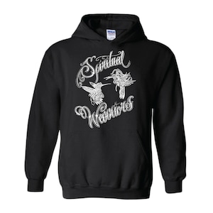 May include: Black hooded sweatshirt with a white graphic design of two hummingbirds and the text "Spiritual Warriors".