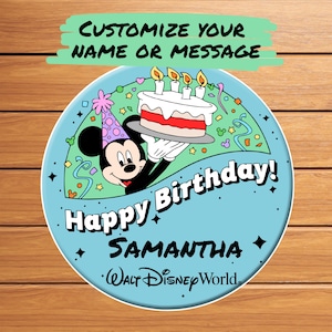 May include: A round, light blue graphic featuring Mickey Mouse holding a birthday cake. The text "Happy Birthday!" and "SAMANTHA" are displayed, along with "Walt Disney World." The top banner reads "CUSTOMIZE YOUR NAME OR MESSAGE."