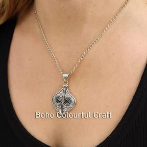 Antique Silver Tribal Swirl Leaf Pendant – Boho Ethnic Charm for Handmade & Statement Jewelry Making