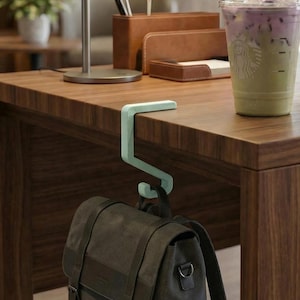 Elegant No-Slip Purse Hook: Portable Bag Holder for Tables, Secure Hanger for Handbags & Backpacks, College Dorm Gifts Dorm Hanger