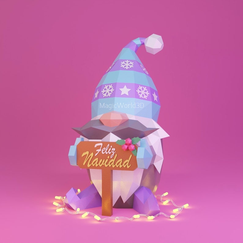 May include: A 3D rendered Christmas gnome with a blue and purple hat, holding a sign that says "Feliz Navidad". The gnome has a white beard, mustache, and is surrounded by a string of yellow lights. The background is pink.