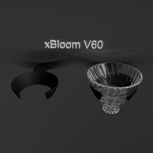 Könnte beinhalten: Eine klare Glasschale mit geripptem Design. Die Schale ist Teil einer Leuchte namens xBloom V60.