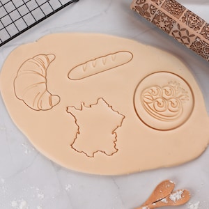 Juego de cortadores de galletas con motivos de país francés: cortadores de galletas con forma de croissant, baguette, caracoles y mapa de Francia