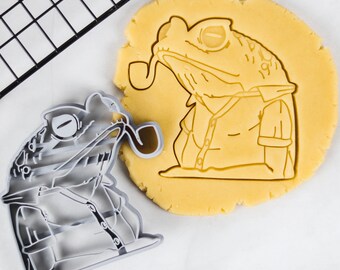 Cortador de galletas en forma de rana con pipa - Un accesorio de repostería único y divertido