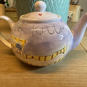 Whittard of Chelsea Teekanne, die eine dicke Katze und Sex Kätzchen darstellt