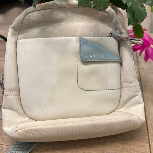 Radley designer backpack in cream and pale blue leather with material surround