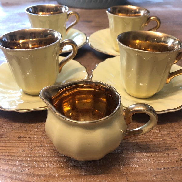 Absolutely stunning Demi tasse set of 4 fine bone china gilt edged and gold cups saucers and milk jug. Made in England by Wade potteries