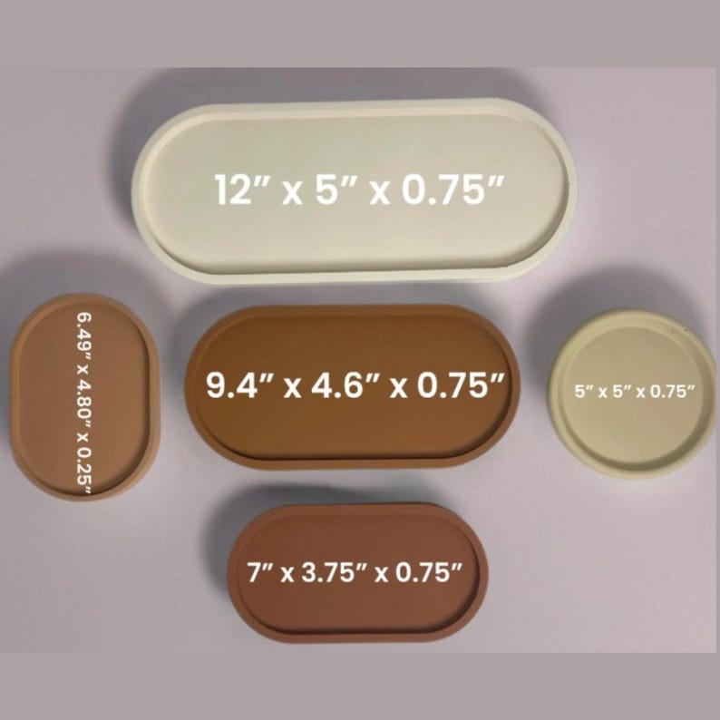 May include: A collection of oval-shaped trays in various sizes and colors. The trays are in shades of beige and brown. Measurements are provided in inches: 12" x 5" x 0.75", 9.4" x 4.6" x 0.75", 7" x 3.75" x 0.75", 6.49" x 4.80" x 0.25", and 5" x 5" x 0.75".