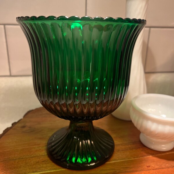 Emerald green glass footed vase