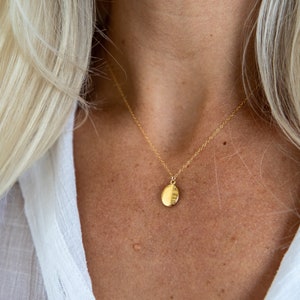 Simple gold locket design deals