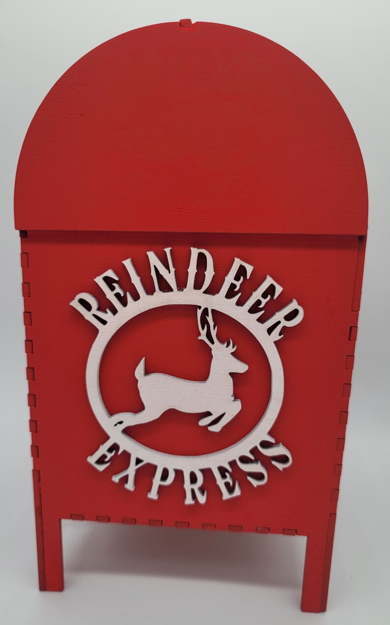 May include: Red wooden mailbox with a white reindeer and the words "Reindeer Express" on the front.