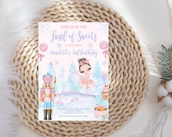 May include: A pink and blue invitation card with a watercolour illustration of a ballerina and a nutcracker. The text on the card reads "Join us in the Land of Sweets to celebrate Annabeth's 2nd birthday".