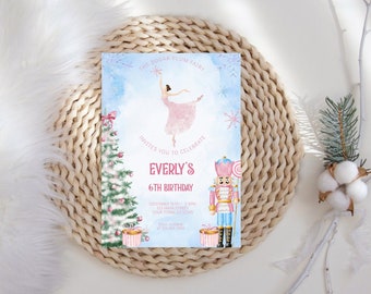 May include: A light blue invitation card with a watercolor design. The card features a ballerina, a Christmas tree, and a nutcracker. Text includes "The Sugar Plum Fairy invites you to celebrate Everly's 6th Birthday".