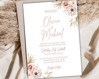May include: Wedding invitation with a floral design in shades of pink and white. The invitation features the names Olivia and Micheal, the date Saturday, July Sixteenth, Twenty Twenty Four, and the location Oakwood Country Club, 123 Oak Lane, Oakton, TN. Reception to follow.