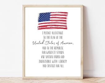 May include: A printable wall art design featuring a red, white, and blue American flag with a brushstroke effect. The text below the flag reads "I pledge allegiance to the flag of the United States of America, and to the republic for which it stands. One nation, under God, indivisible, with liberty and justice for all."