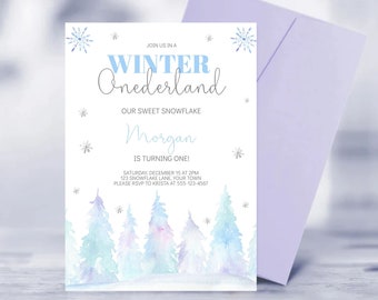 May include: A winter-themed invitation with the text "Winter Onederland" in blue and black. The invitation includes the name "Morgan" and the phrase "is turning one!" A matching lavender envelope is included.