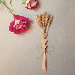 7 lucky wheat strands. With the addition of a personalized hanging heart and a free gift envelope. Wheat wedding gift.