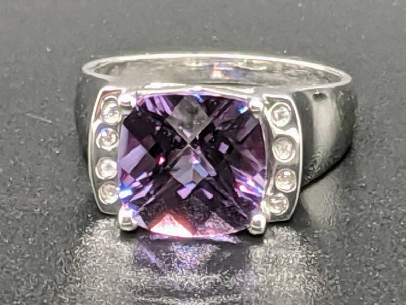 Size 7.25 US set in Sterling Silver with .12 CT Cubic Zirconia Accents 5.40 CT Alexandrite Ring