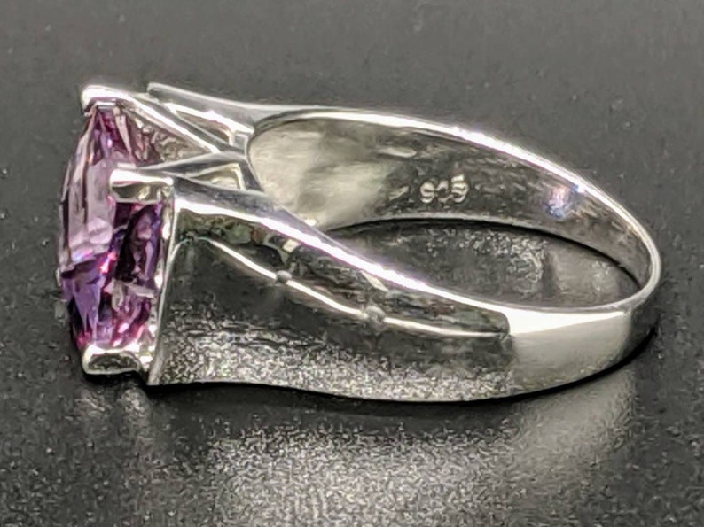Size 7.25 US set in Sterling Silver with .12 CT Cubic Zirconia Accents 5.40 CT Alexandrite Ring